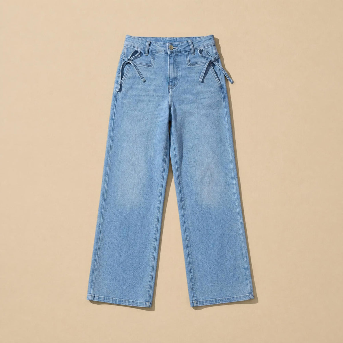 Jeans pierna amplia mujer azul deslavado con moños - prenda sola